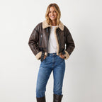 Damen Lammfell-Bomberjacke mit doppelseitigem Design und kurzer Passform