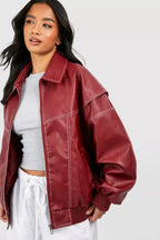 Damen Oversized-Steppjacke aus Kunstleder mit Kontrastnähten und Reißverschluss