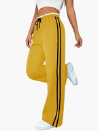 Damen Jogginghose mit Seitenstreifen – Weite Track Pants mit elastischem Bund