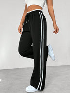 Damen Wide Leg Jogginghose mit Seitenstreifen und Kordelzug – Track Pants mit elastischem Bund