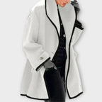 Damen eleganter Mantel mit Kontrastkanten, großem Revers und Knopfverschluss