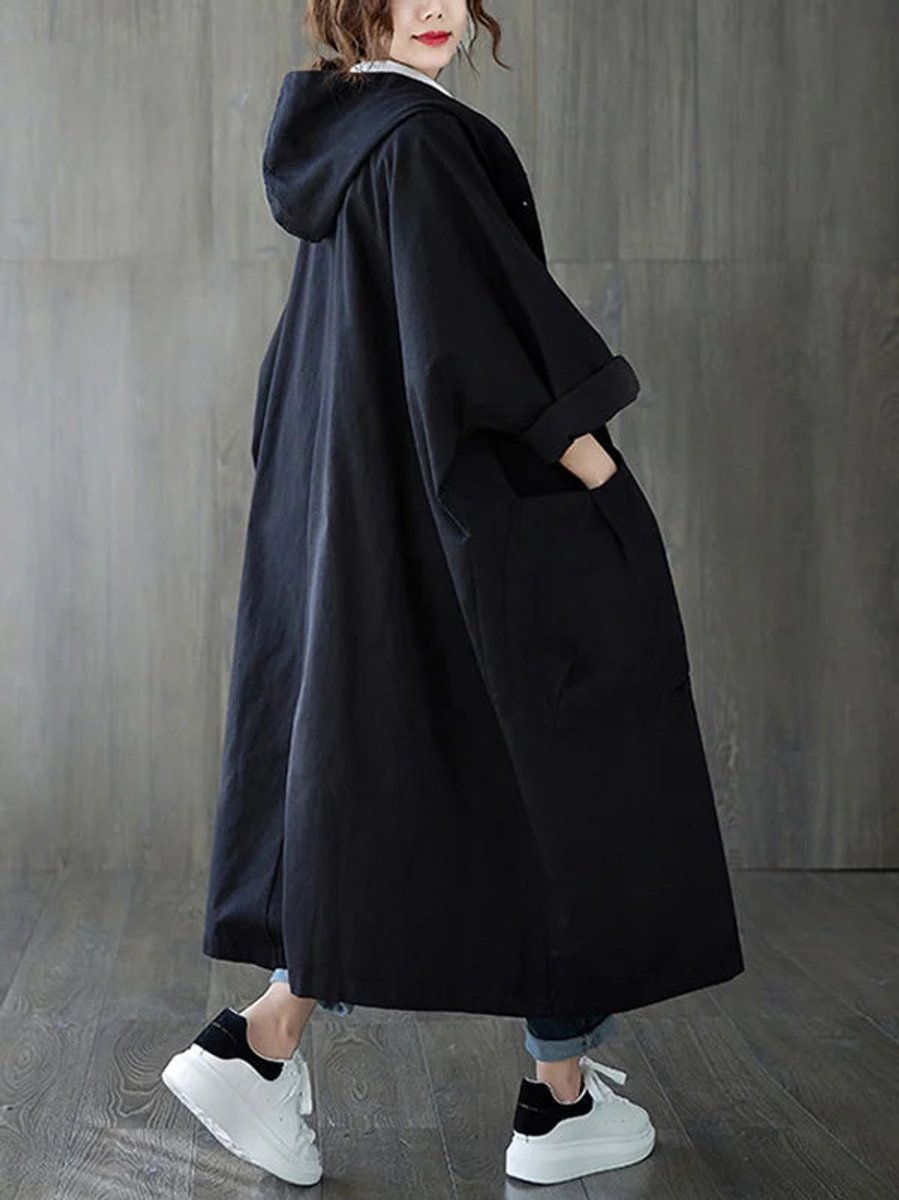 Damen langer Oversized-Kapuzen-Trenchcoat mit wasserabweisendem Material und aufgesetzten Taschen