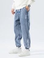 Herren Jeans mit elastischem Bund, Kordelzug und gerippten Beinabschlüssen