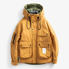 Herren Winterparka wattiert und wasserdicht mit Kapuze – Outdoor Jacke im Cargo-Stil