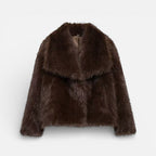 Damen Kunstfelljacke mit kurzem Schnitt und breitem Kragen