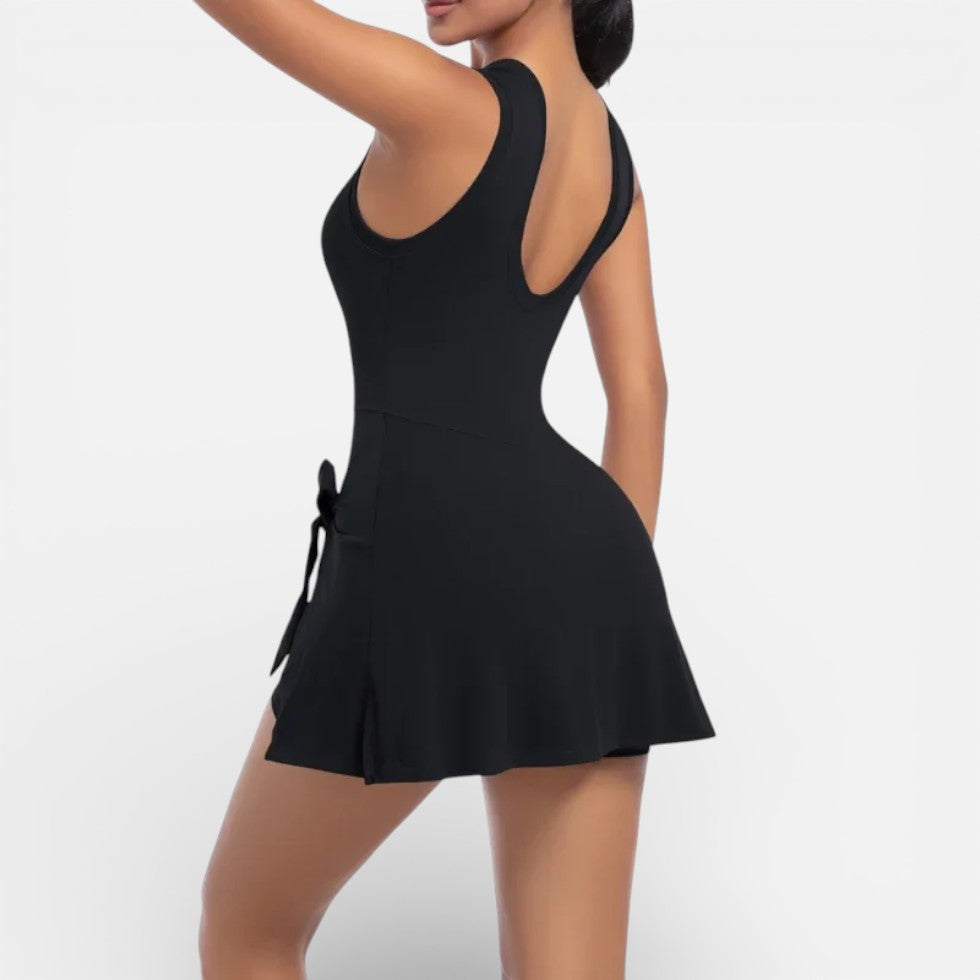 Women's sports dress with integrated shorts and tie waist