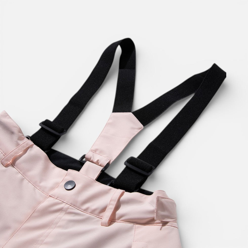 Women's ski pants with suspenders for winter sports and outdoor activities