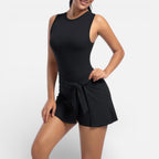 Women's sports dress with integrated shorts and tie waist