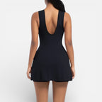 Women's sports dress with integrated shorts and tie waist