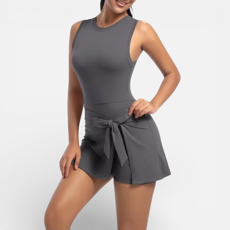 Women's sports dress with integrated shorts and tie waist