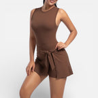 Women's sports dress with integrated shorts and tie waist