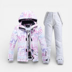 Women's ski suit with hooded jacket and ski pants