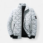 Puffer jacket with stand-up collar and zippered pockets