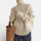 Damen Strickpullover aus Merinowolle mit Rollkragen und lockerem Schnitt