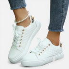 Sneakers til damer med quiltet look og snørebånd