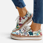 Sneaker mit Blumenmuster und Reißverschluss