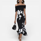 Grøn midikjole med blomstermønster og off-shoulder-udskæring