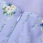 Lang kjole med elegant blomstermønster