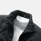Puffer jacket with stand-up collar and zippered pockets