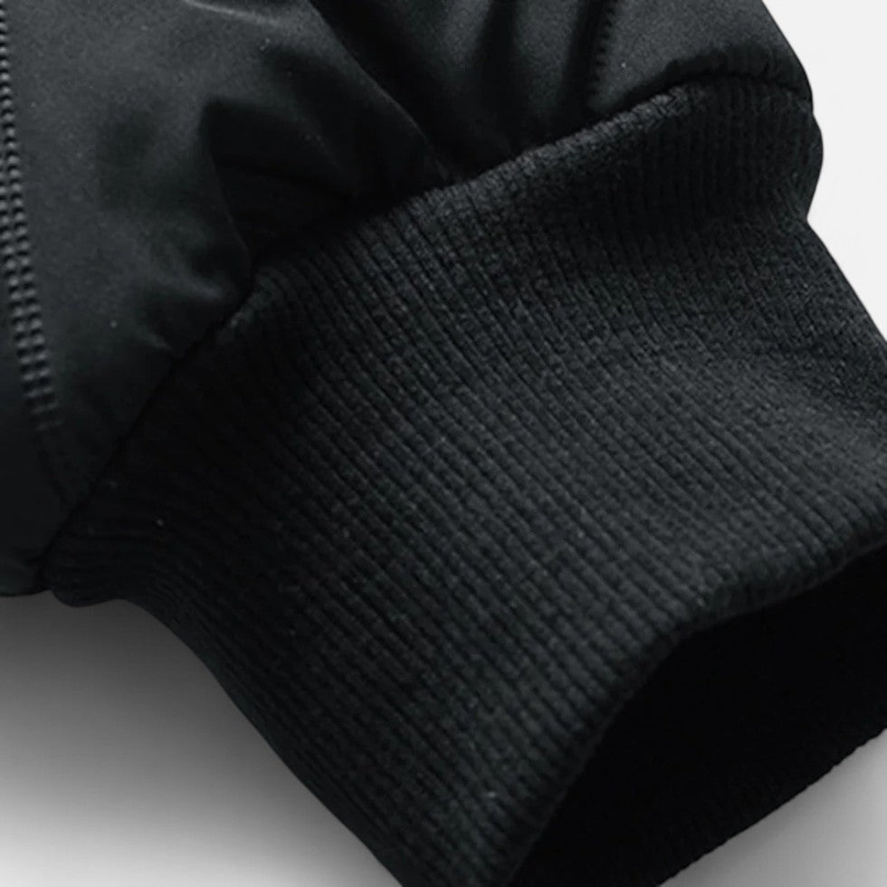 Puffer jacket with stand-up collar and zippered pockets