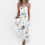 Dame-overall med blomsterprint og vide ben