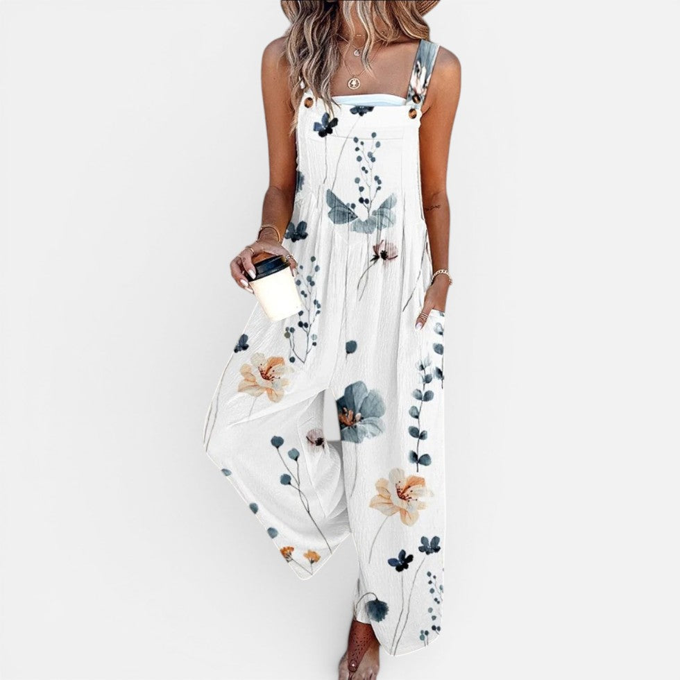 Dame-overall med blomsterprint og vide ben