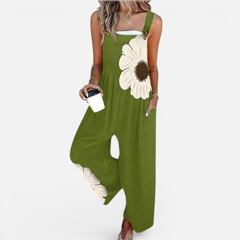 Dame-overall med blomsterprint og vide ben