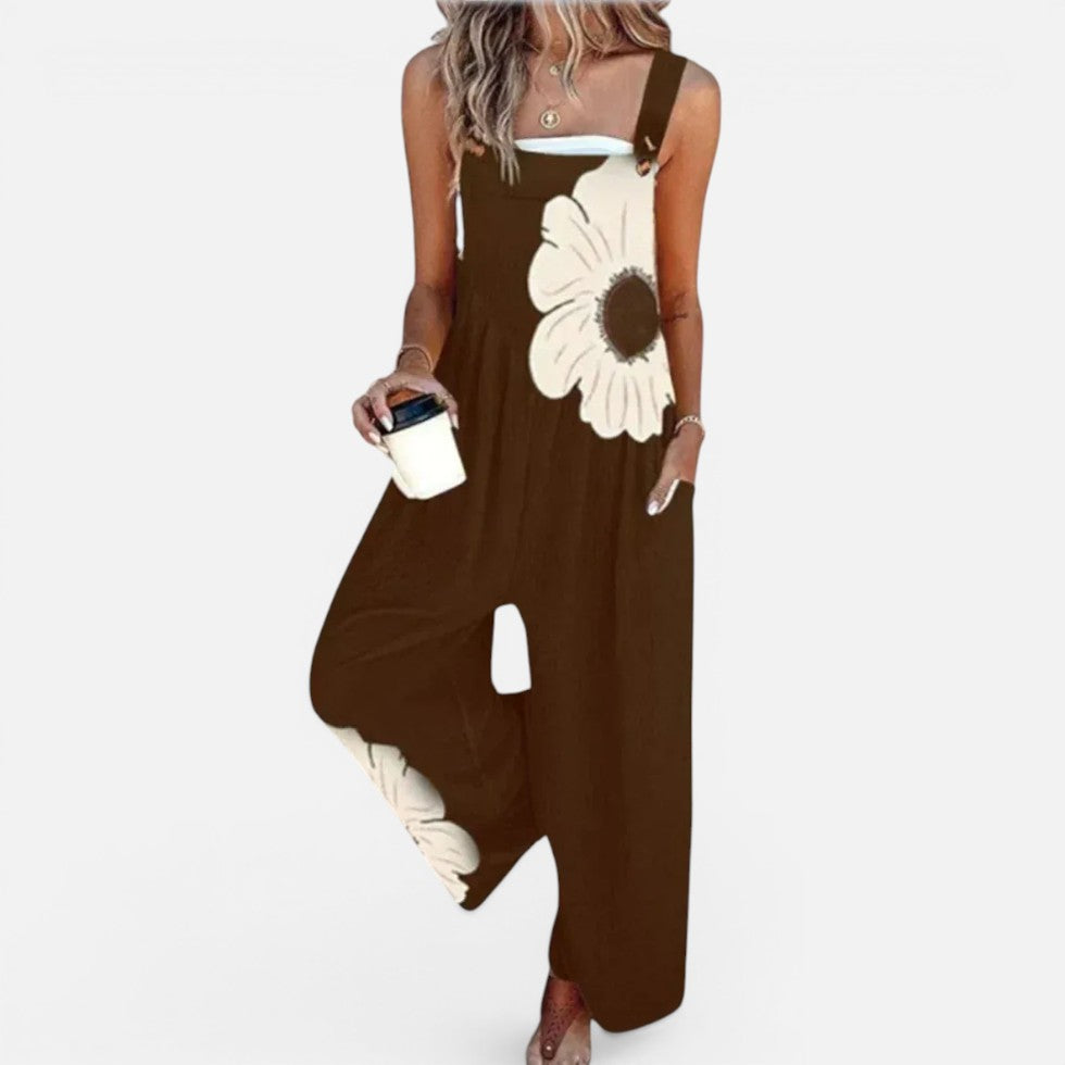 Dame-overall med blomsterprint og vide ben