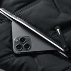 Puffer jacket with stand-up collar and zippered pockets