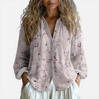 Damebluse med V-udskæring og blomstermønster