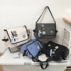 Umhängetasche mit Überschlag und verstellbarem Schultergurt