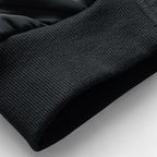 Puffer jacket with stand-up collar and zippered pockets