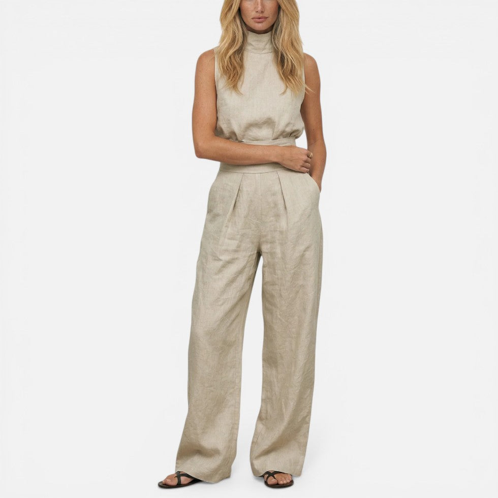 Ærmeløs jumpsuit med vide ben og høj krave