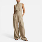 Ærmeløs jumpsuit med vide ben og høj krave