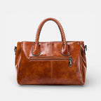 Damen Handtasche mit geflochtenen Griffen und mehreren Fächern