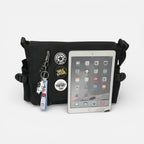 Umhängetasche mit Überschlag und verstellbarem Schultergurt