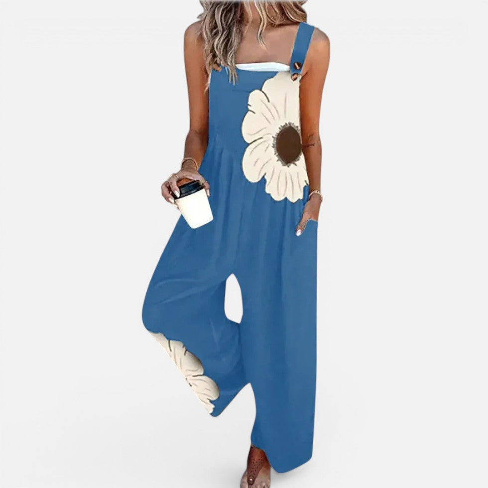Dame-overall med blomsterprint og vide ben